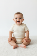 Organic Baby Bodysuit – Front